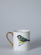 Porcelain mug featuring a detailed illustration of a great tit